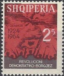 Revolutionists with Albanian flag and rising Sun