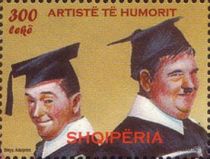 Laurel and Hardy Wearing Mortarboards