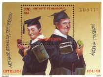 Laurel and Hardy Wearing Mortarboards