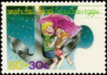 Children on anchor with umbrella