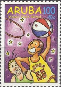 Two boys playing basketball