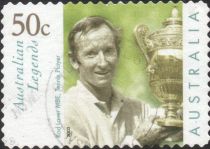 Rod Laver with Wimbledon Trophy