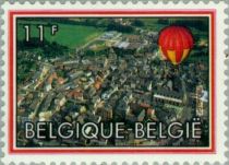 Red and yellow Hot air balloon and urban site