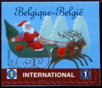 Santa Claus, Reindeer, Sleigh International - Left imperf