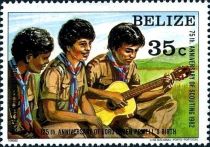 Three Scouts, One Playing Guitar