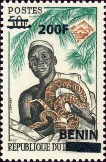 Ouidah witch doctor and python