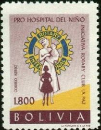 Rotary Emblem and nurse with children