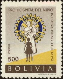 Rotary Emblem and nurse with children