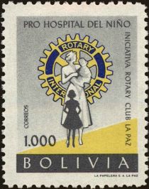 Rotary Emblem and nurse with children