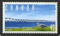 Great Blue Heron (Ardea herodias) and Confederation Bridge