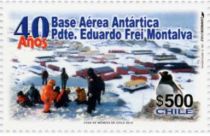 People and Gentoo Penguin; Base in background