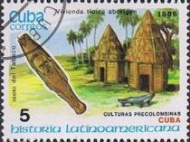 Tabaco idol and typical aboriginal houses (Cuba)