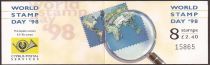 World Stamp Day '98 - Continents and a magnifying glass